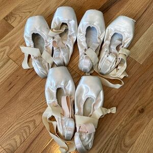 3 pairs used dead pointe shoes